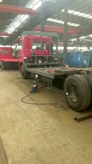 Autocarro con gru da carico a pianale Dayun 8X4 con rampa per argano per autocarro con gru a pianale per trasporto di macchinari pesanti